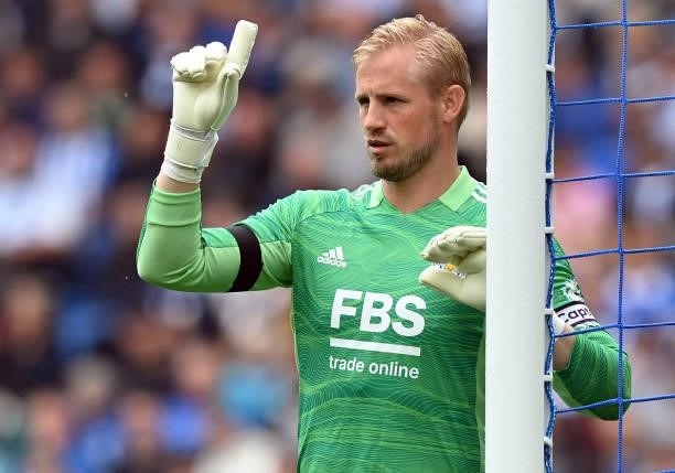Leicester City's Danish goalkeeper Kasper Schmeichel directs his team mates assemble a defensive wall during the English Premier League football...