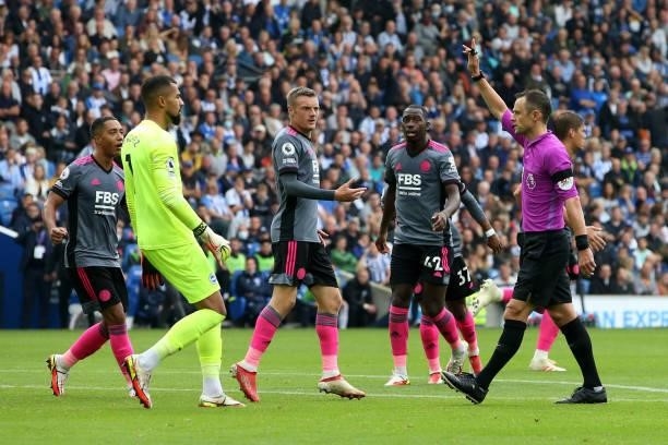 Referee Stuart Attwell disallows Harvey Barnes of Leicester City's goal for offside during the Premier League match between Brighton & Hove Albion...