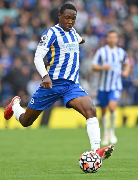 Brighton's Zambian midfielder Enoch Mwepu runs with the ball during the English Premier League football match between Brighton and Hove Albion and...