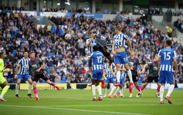 Wilfred Ndidi of Leicester City heads the ball towards goal during the Premier League match between Brighton & Hove Albion and Leicester City at...