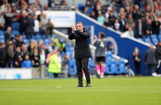 Leicester City Manager Brendan Rodgers applauds the travelling Leicester City fans after the Premier League match between Brighton & Hove Albion and...