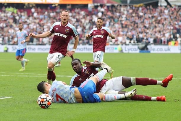 Kurt Zouma of West Ham tackles Cristiano Ronaldo of Man Utd in the box during the Premier League match between West Ham United and Manchester United...