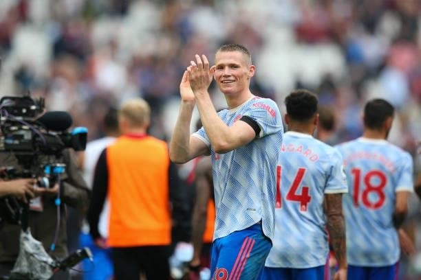 Scott McTominay of Manchester United applauds the fans at the final whistle during the Premier League match between West Ham United and Manchester...