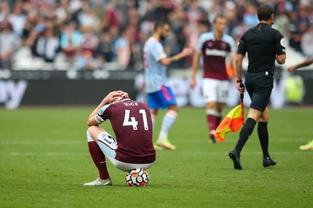 Declan Rice of West Ham United looks dejected at the final whistle during the Premier League match between West Ham United and Manchester United at...
