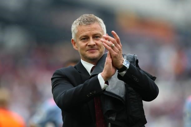 Manchester United manager Ole Gunnar Solskjaer applauds the fans after his sides victory during the Premier League match between West Ham United and...