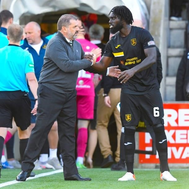 Celtic manager Ange Postecoglou and Livingston's Ayo Obileye at full time during a cinch Premiership match between Livingston and Celtic at the Tony...
