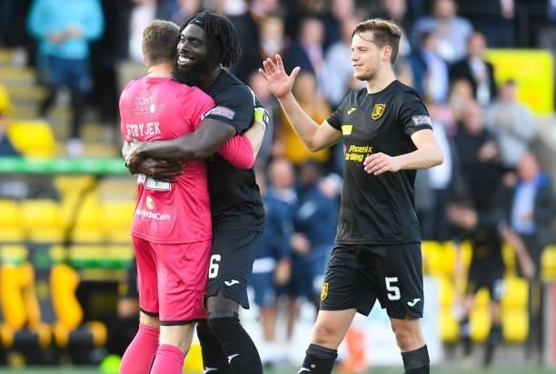 Livingston goalkeeper Max Stryjek with Ayo Obileye and Jack Fitzwater at full time during a cinch Premiership match between Livingston and Celtic at...