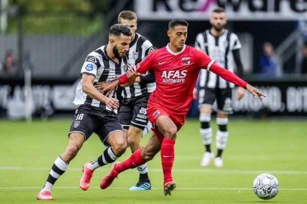 Ismail Azzaoui of Heracles Almelo, Tijjani Reijnders of AZ during the Dutch Eredivisie match between Heracles Almelo and PSV Eindhoven at the Erve...