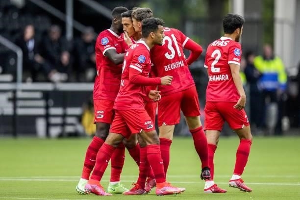 Players celebrate the 2-2 of Tijjani Reijnders of AZ during the Dutch Eredivisie match between Heracles Almelo and PSV Eindhoven at the Erve Asito...