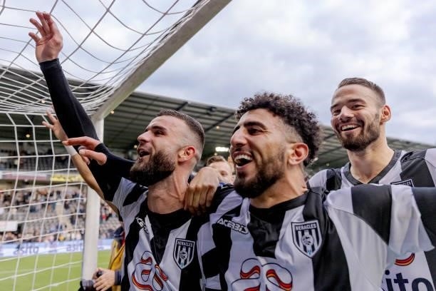 Rai Vloet of Heracles Almelo, Bilal Basacikoglu of Heracles Almelo celebrates the victory during the Dutch Eredivisie match between Heracles Almelo v...