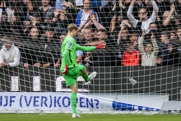 Goalkeeper Peter Vindahl kicks away cups during the Dutch Eredivisie match between Heracles Almelo and PSV Eindhoven at the Erve Asito Stadium on...