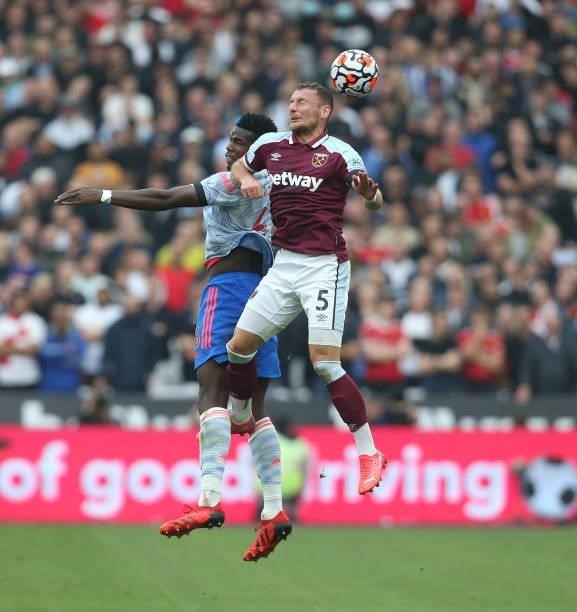 West Ham United's Vladimir Coufal and Manchester United's Paul Pogba during the Premier League match between West Ham United and Manchester United at...