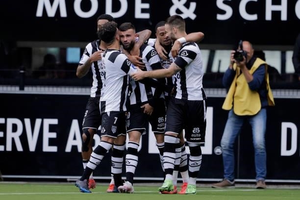 Rai Vloet of Heracles Almelo celebrates 3-2 with Bilal Basacikoglu of Heracles Almelo during the Dutch Eredivisie match between Heracles Almelo v AZ...