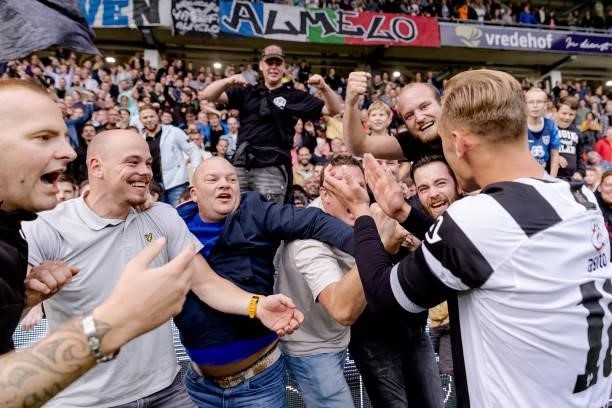 Kaj Sierhuis of Heracles Almelo celebrates the victory with supporters during the Dutch Eredivisie match between Heracles Almelo v AZ Alkmaar at the...