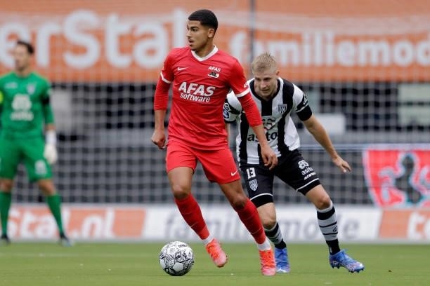 Zakaria Aboukhlal of AZ Alkmaar, Mats Knoester of Heracles Almelo during the Dutch Eredivisie match between Heracles Almelo v AZ Alkmaar at the...