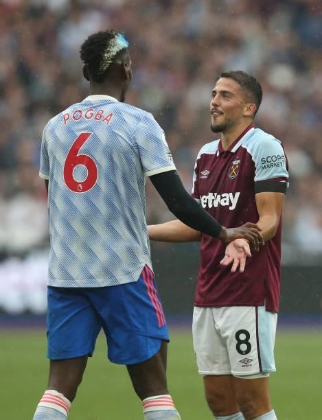Manchester United's Paul Pogba and West Ham United's Pablo Fornals during the Premier League match between West Ham United and Manchester United at...