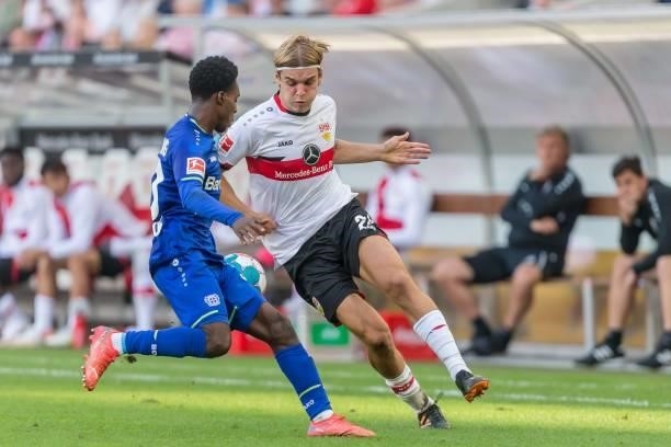 Jeremie Frimpong of Bayer 04 Leverkusen and Borna Sosa of VfB Stuttgart battle for the ball during the Bundesliga match between VfB Stuttgart and...