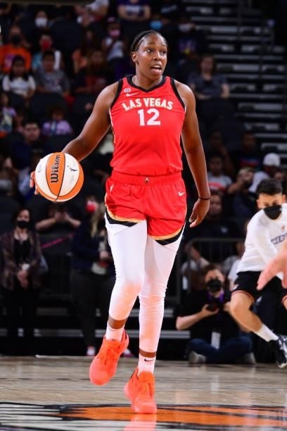 Chelsea Gray of the Las Vegas Aces dribbles the ball during the game against the Phoenix Mercury on September 19, 2021 at Footprint Center in...
