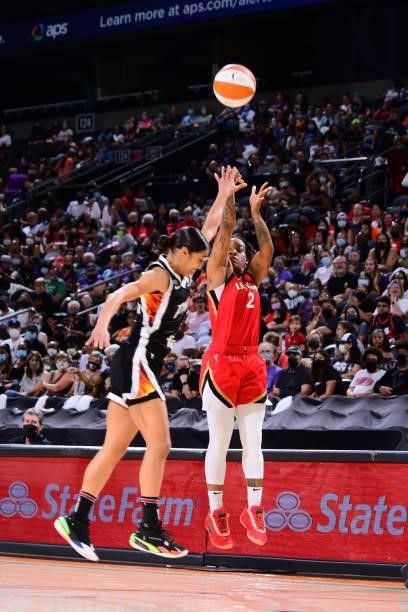Riquna Williams of the Las Vegas Aces shoots a three point basket during the game against the Phoenix Mercury on September 19, 2021 at Footprint...