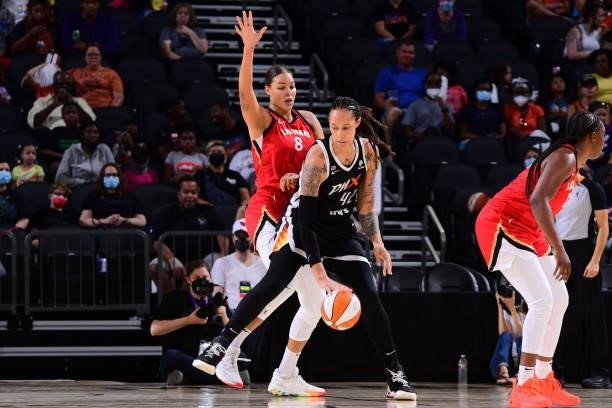 Liz Cambage of the Las Vegas Aces plays defense on Brittney Griner of the Phoenix Mercury during the game on September 19, 2021 at Footprint Center...