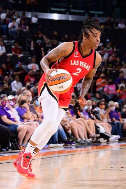 Riquna Williams of the Las Vegas Aces dribbles the ball during the game against the Phoenix Mercury on September 19, 2021 at Footprint Center in...