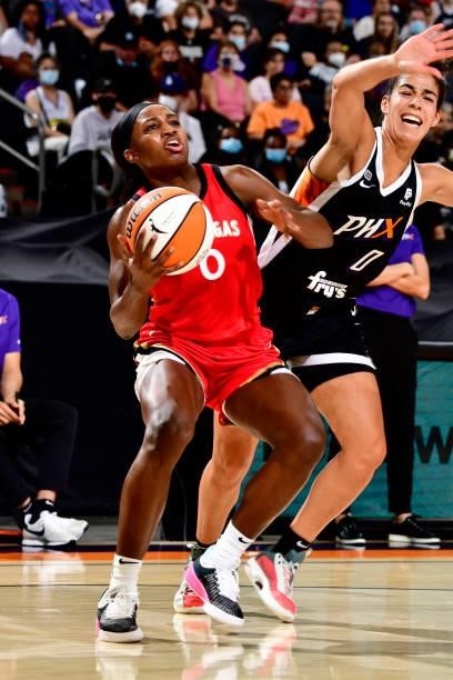 Jackie Young of the Las Vegas Aces handles the ball during the game against the Phoenix Mercury on September 19, 2021 at Footprint Center in Phoenix,...