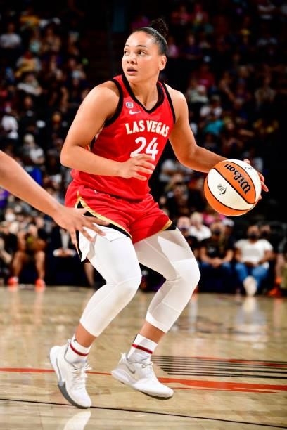 Destiny Slocum of the Las Vegas Aces dribbles the ball during the game against the Phoenix Mercury on September 19, 2021 at Footprint Center in...