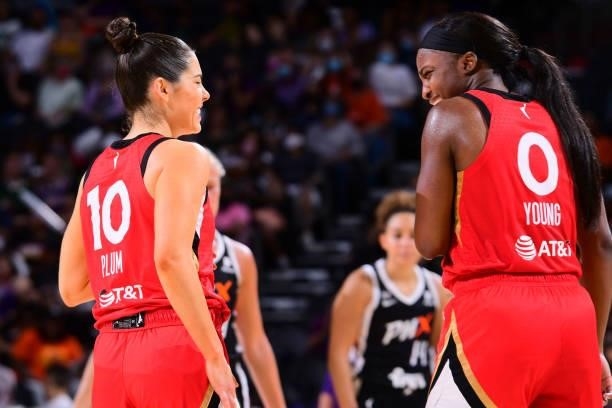 Kelsey Plum talks with Jackie Young of the Las Vegas Aces during the game against the Phoenix Mercury on September 19, 2021 at Footprint Center in...