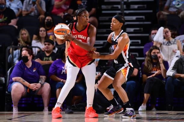 Chelsea Gray of the Las Vegas Aces handles the ball during the game against the Phoenix Mercury on September 19, 2021 at Footprint Center in Phoenix,...