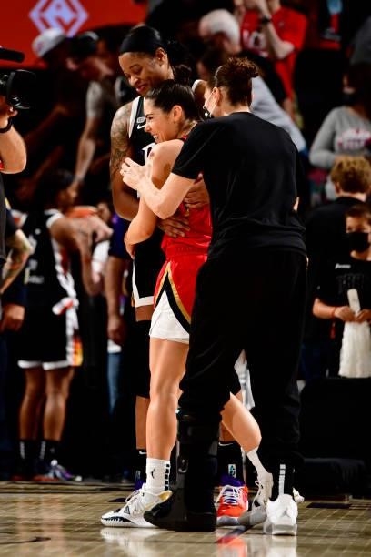 Kia Vaughn and Diana Taurasi of the Phoenix Mercury congratulate Kelsey Plum of the Las Vegas Aces after the game on September 19, 2021 at Footprint...