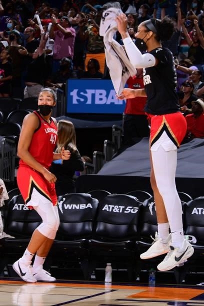 Kiah Stokes of the Las Vegas Aces and A'ja Wilson celebrate during the game against the Phoenix Mercury on September 19, 2021 at Footprint Center in...