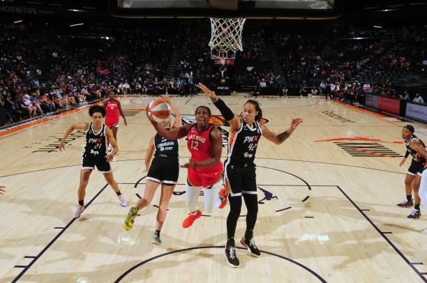 Chelsea Gray of the Las Vegas Aces shoots the ball during the game against the Phoenix Mercury on September 19, 2021 at Footprint Center in Phoenix,...