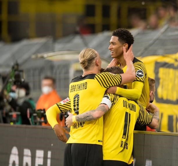 Jude Bellingham, Erling Haaland and Marco Reus celebrate the own goal to the 3:0 during the Bundesliga match between Borussia Dortmund and 1. FC...