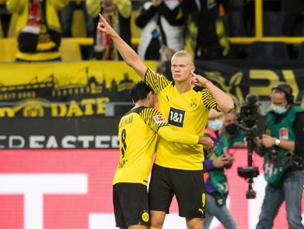 Erling Haaland celebrates his goal to the 4:2 with Mahmoud Dahoud during the Bundesliga match between Borussia Dortmund and 1. FC Union Berlin on...