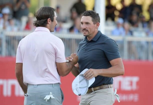 Max Homa and Scott Stallings shake hands on the 18th green during the final round of the Fortinet Championship at Silverado Resort and Spa North on...