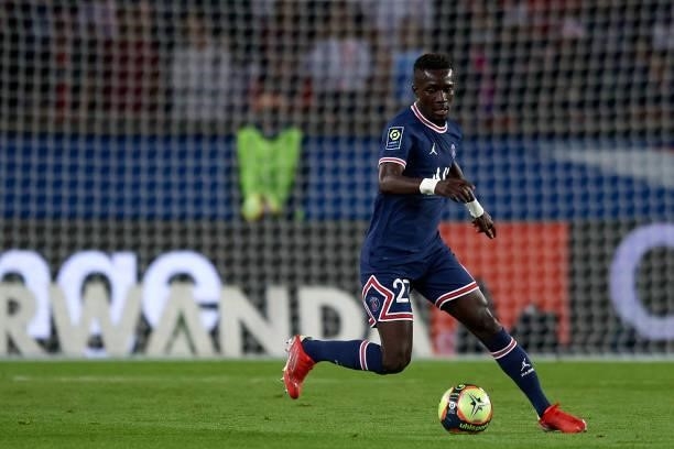 Idrissa Gueye of PSG runs with the ball during the Ligue 1 Uber Eats match between Paris Saint Germain and Lyon at Parc des Princes on September 19,...