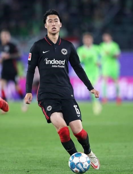 Frankfurt's Japanese midfielder Daichi Kamada plays the ball during the German first division Bundesliga football match VfL Wolfsburg vs Eintracht...