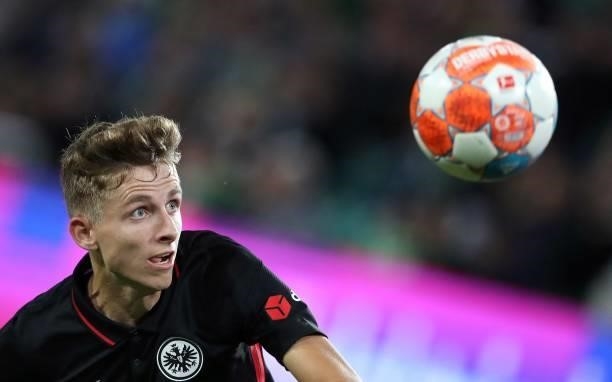 Frankfurt's Danish midfielder Jesper Lindstrom focusses the ball during the German first division Bundesliga football match VfL Wolfsburg vs...