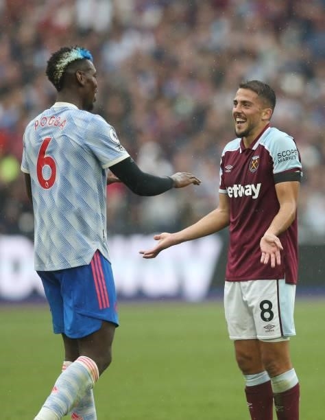 Manchester United's Paul Pogba and West Ham United's Pablo Fornals during the Premier League match between West Ham United and Manchester United at...