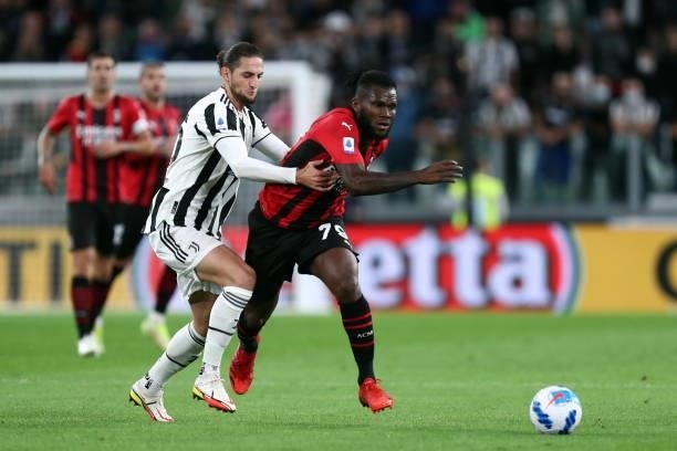 Franck Kessie of AC Milan and Adrien Rabiot of Juventus FC battle for the ball during the Serie A match between Juventus and AC Milan at Allianz...