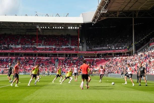 Players of PSV during the warming up during the Dutch Eredivisie match between PSV v Feyenoord at the Philips Stadium on September 19, 2021 in...