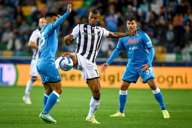 Walace Souza Silva hindered by Adam Ounas during the Italian football Serie A match Udinese Calcio vs SSC Napoli on September 20, 2021 at the Friuli...