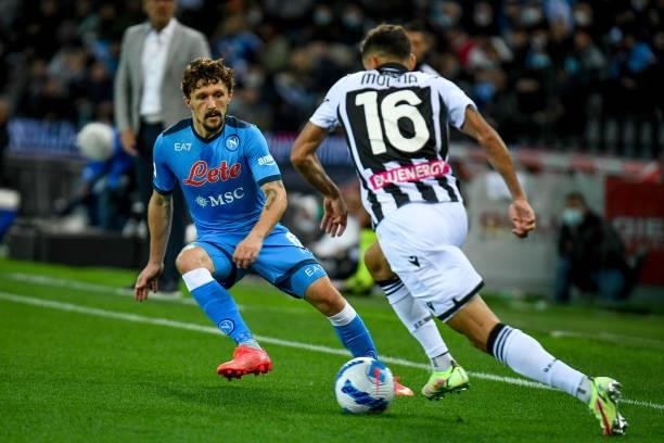 Nahuel Molina in action against Mario Rui during the Italian football Serie A match Udinese Calcio vs SSC Napoli on September 20, 2021 at the Friuli...
