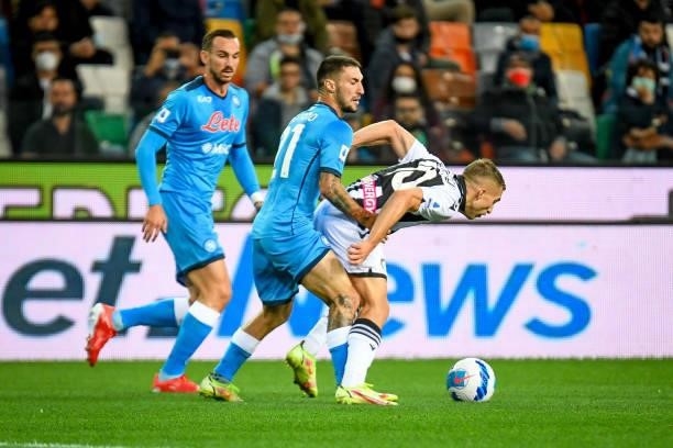 Gerard Deulofeu hindered by Matteo Politano during the Italian football Serie A match Udinese Calcio vs SSC Napoli on September 20, 2021 at the...