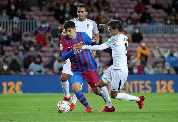 Yusuf Demir and Luis Milla during the match between FC Barcelona and Granada CF, corresponding to the week 5 of the group A of the Liga Santander,...