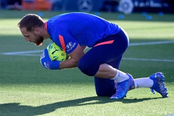 Atletico Madrid's Slovenian goalkeeper Jan Oblak warms up prior the Spanish League football match between Getafe CF and Club Atletico de Madrid at...