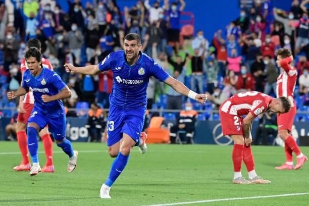 Getafe's Serbian defender Stefan Mitrovic celebrates his goal during the Spanish League football match between Getafe CF and Club Atletico de Madrid...