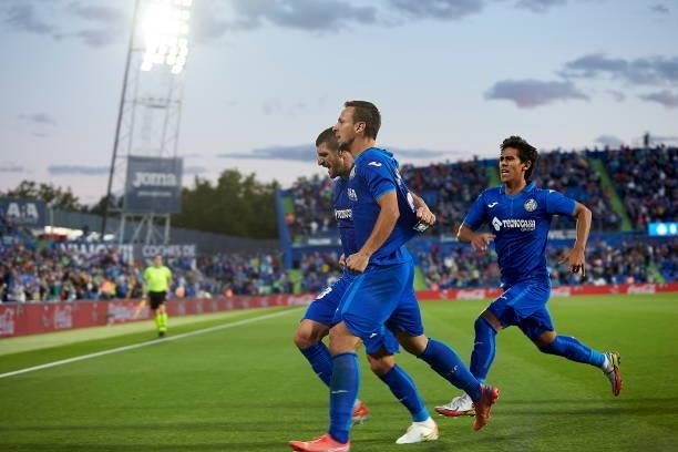 Mitrovic of Getafe CF celebrates after scoring his team's first goal with teammates during the LaLiga Santander match between Getafe CF and Club...