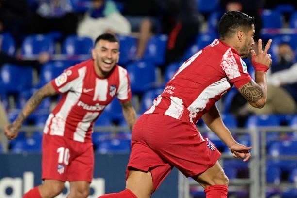 Atletico Madrid's Uruguayan forward Luis Suarez celebrates his second goal during the Spanish League football match between Getafe CF and Club...