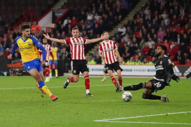 Armando Broja of Southampton has his near certain winning goal saved by goalkeeper Wes Foderingham during the Carabao Cup Third Round match between...